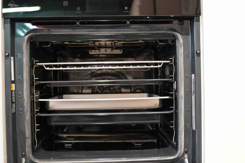 Design L-Küche Weiß Hochglanz Front mit Bauknecht Elekro-geräte
